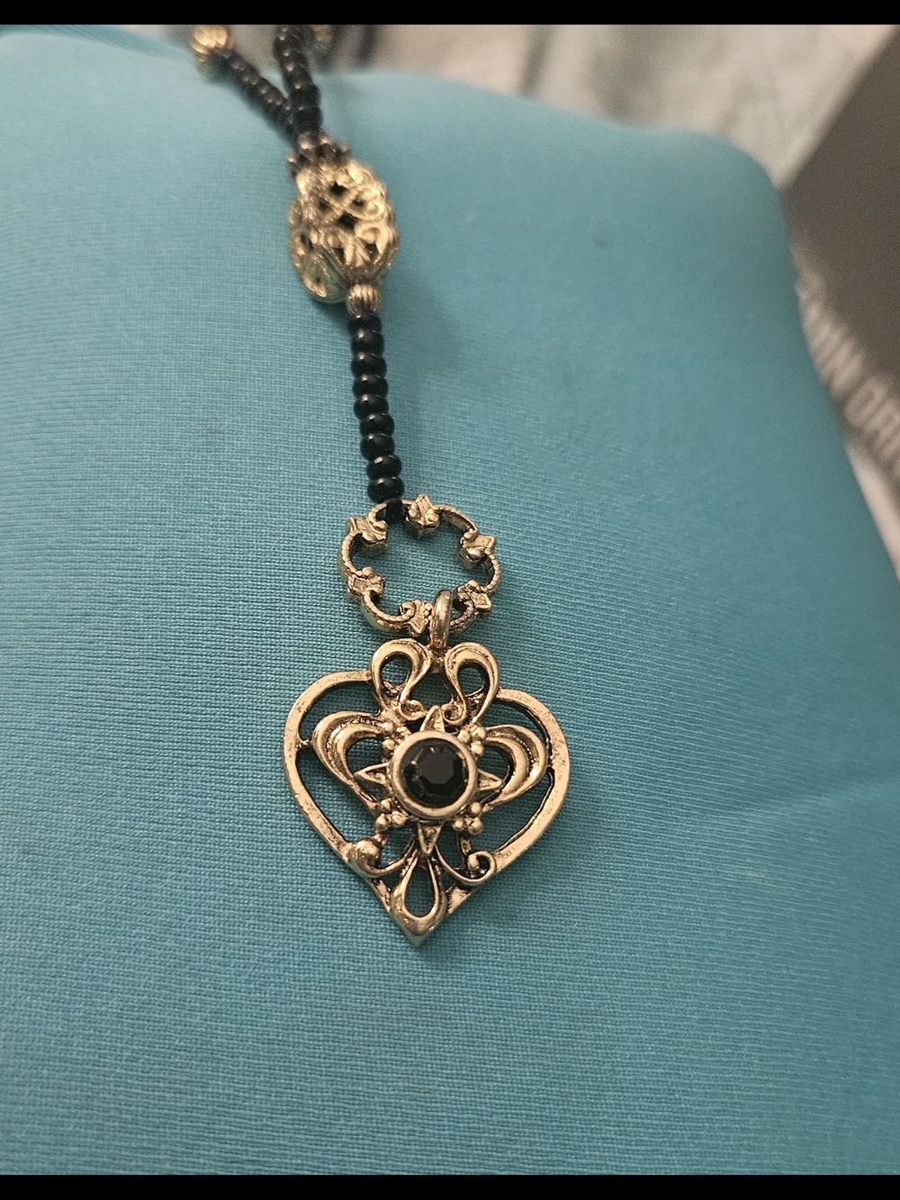 The Limited Gold-Tone Ornate Heart Necklace with Black Beads